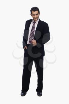Portrait of a businessman standing with his hand in pocket
