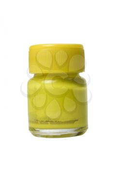 Close-up of a yellow watercolor bottle