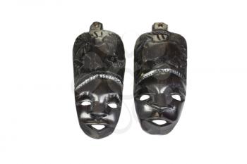 Close-up of two wooden masks