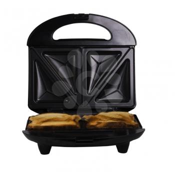 Close-up of a toaster with bread slices