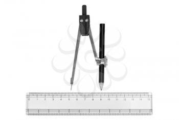 Close-up of a drawing compass with a pencil and a ruler