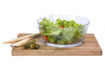 Close-up of a bowl of salad on a cutting board