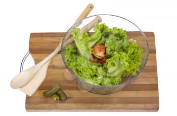 Close-up of a bowl of salad on a cutting board
