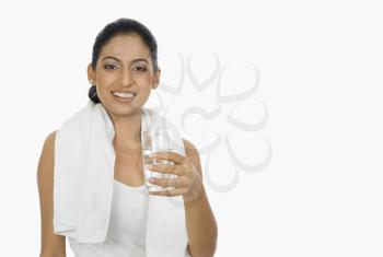 Woman holding a glass of water