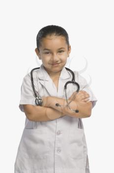 Girl dressed as a doctor and smiling