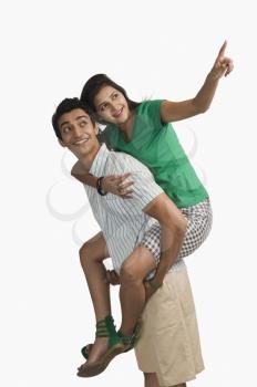Woman riding piggyback on a man