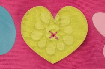 Close-up of a heart shape on a baby's top