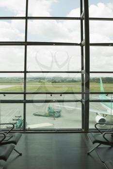 Airplane viewed through an airport lounge window, Cork Airport, Cork, County Cork, Republic of Ireland
