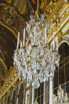 Chandelier hanging in the corridor of a palace, Hall Of Mirrors, Chateau de Versailles, Versailles, Paris, France