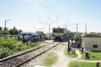 Passenger train moving on railroad tracks, Kanchipuram, Tamil Nadu, India