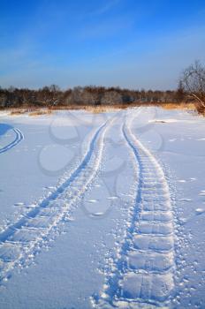 rural road on winter field