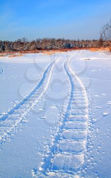 rural road on winter field