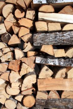 firewood in stack of logs