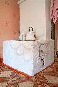 brick stove in rural wooden house