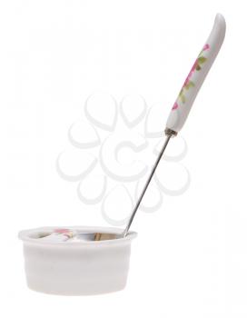 The big spoon in a support on a white background.                   