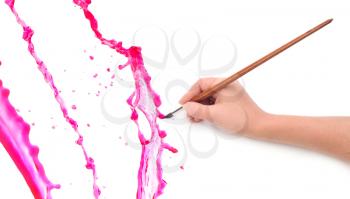 Hand with brushand paint splash