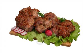 Smoked chicken kebab with small radish, celery and lettuce on wooden board.