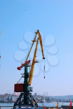 Crane loading cargo in the port
