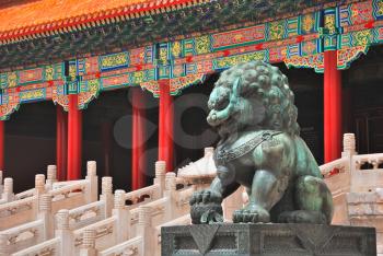 Bronze lion near the entrance to Temple in Forbidden City