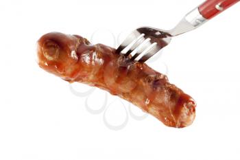 Royalty Free Photo of Fried Sausage on a Fork