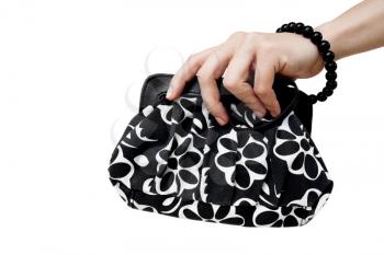 Royalty Free Photo of a Woman's Hand Holding a Black Bag