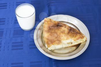 Royalty Free Photo of Burek and a Cup of Yoghurt