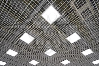 Ceiling lighting in a large room in a mall or warehouse