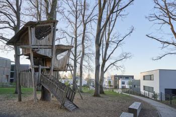 Interesting and unusual, fabulous tree house for children on a playground near a modern residential area in a Europe