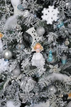 Decorated Christmas tree with different toys, texture