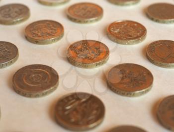 Array of Pound (GBP) coin, currency of United Kingdom (UK) - Perspective with selective focus