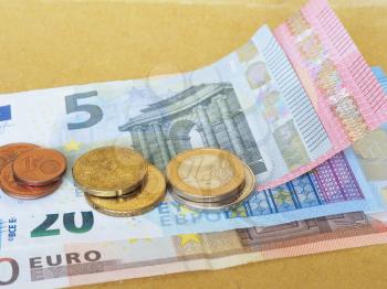 Euro coins and banknotes currency of the European Union - selective focus