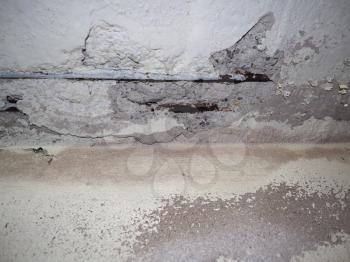 reinforced concrete resistance bars (rebar) damaged by water infiltrations in walls
