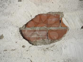 peeled plaster detached from a wall or ceiling due to water infiltrations or dampness