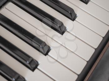 Detail of black and white keys on music keyboard