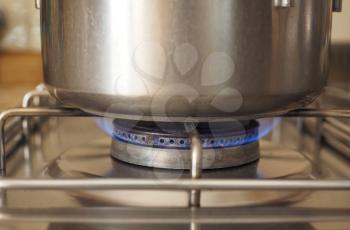 Detail of a saucepot on a gas cooker