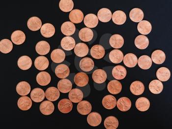One Cent Dollar coins money (USD), currency of United States over black background