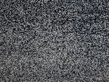 Vintage analog TV screen static noise useful as a background