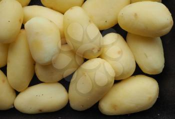Potatoes (Solanum tuberosum) vegetables vegetarian food in a tub