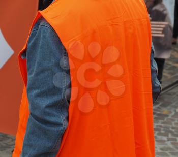orange safety vest as used by workers, staff, security personnel