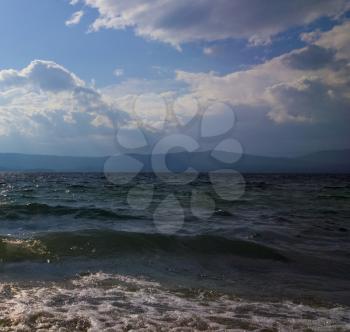 Waves on sea. Storm on lake. End of storm. Nature background
