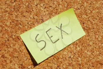 Royalty Free Photo of Sex on a Post-It Note
