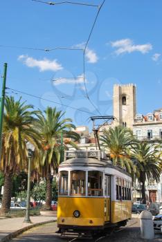 Royalty Free Photo of The Capital of Portugal With Yellow Typical Tram