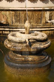Royalty Free Photo of an Antique Snake Fountain