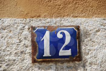 Royalty Free Photo of a House Number Twelve