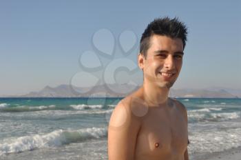 Royalty Free Photo of a Man on a Beach in Greece