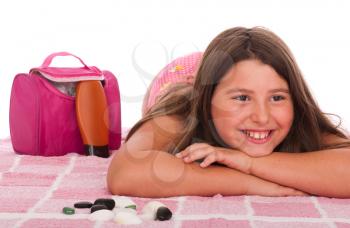 Royalty Free Clipart Image of a Girl Laying on a Towel