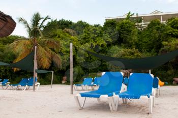 Royalty Free Photo of Beach Chairs on a Resort in Antigua