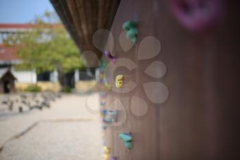 Colorful wall climbing handles for young children