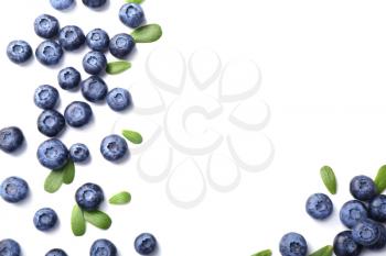 Ripe blueberries on white background�