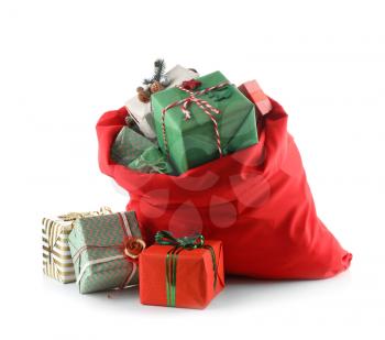 Santa Claus bag full of gifts on white background�